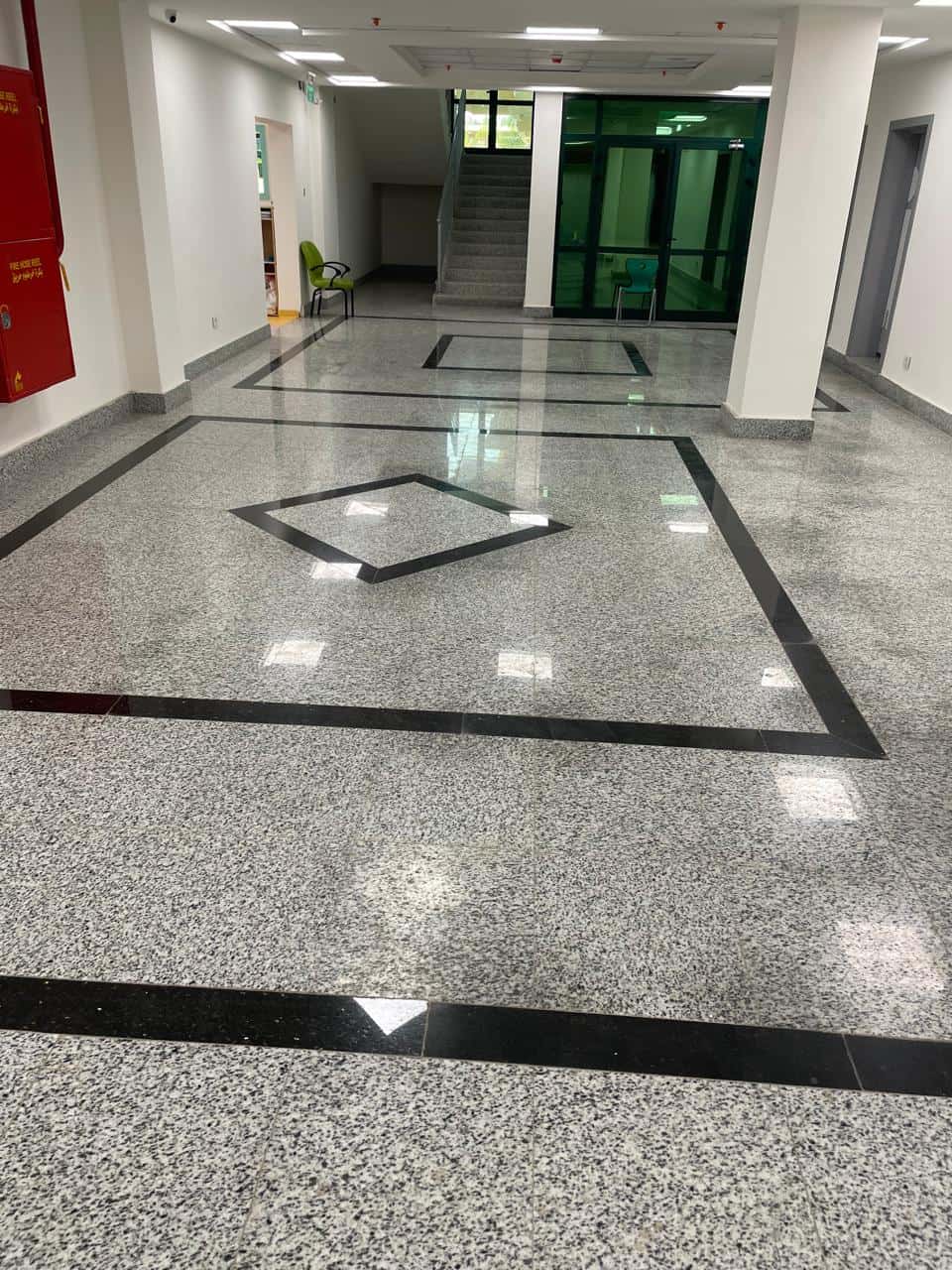 Granite lobby floor with diamond inlay