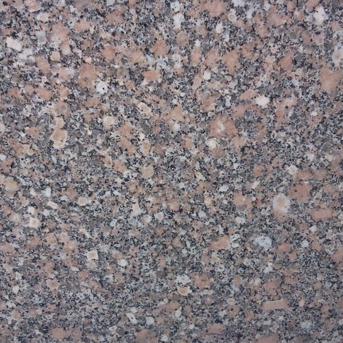 Gandola granite slab face, photographed for the factory catalog — mid-toned grey overall.