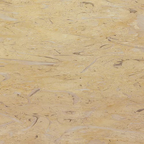 Khatmeya marble slab face, photographed for the factory catalog — light amber overall.