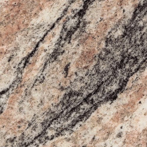 Juparana Tropical Bahia granite slab face, photographed for the factory catalog — mid-toned warm beige overall.