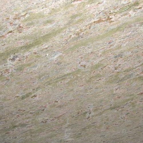 Verde Cascada granite slab face, photographed for the factory catalog — light warm beige overall.