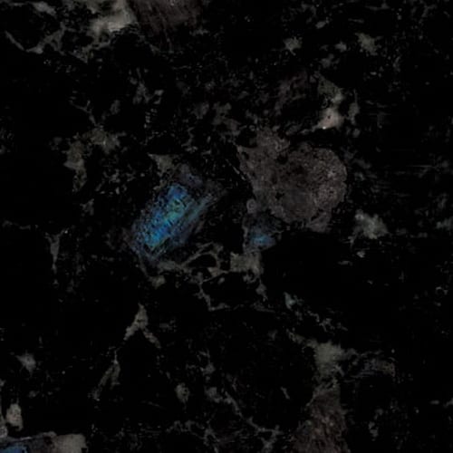 Volga Blue granite slab face, photographed for the factory catalog — near-black grey overall.
