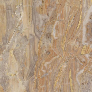 Orobica marble slab face, photographed for the factory catalog — mid-toned amber overall.