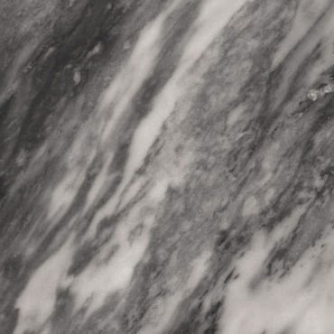 Bardiglio Nuvolato marble slab face, photographed for the factory catalog — mid-toned grey overall.