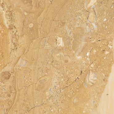 Breccia Oniciata Rosata marble slab face, photographed for the factory catalog — light amber overall.