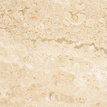 Breccia Sarda Chiara marble slab face, photographed for the factory catalog — near-white amber overall.