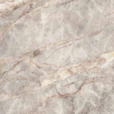 Fior di Pesco Carnico marble slab face, photographed for the factory catalog — light amber overall.