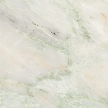 Jakarta Pink marble slab face, photographed for the factory catalog — near-white warm beige overall.