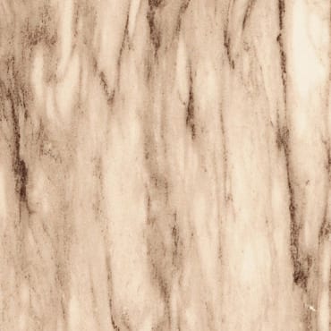 Palissandro Oniciato marble slab face, photographed for the factory catalog — light amber overall.
