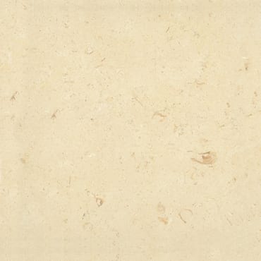 Pierre de Sainte marble slab face, photographed for the factory catalog — near-white gold overall.
